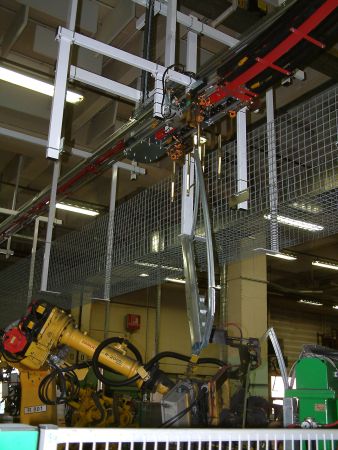 Poste de chargement automatique sur convoyeur à accumulation