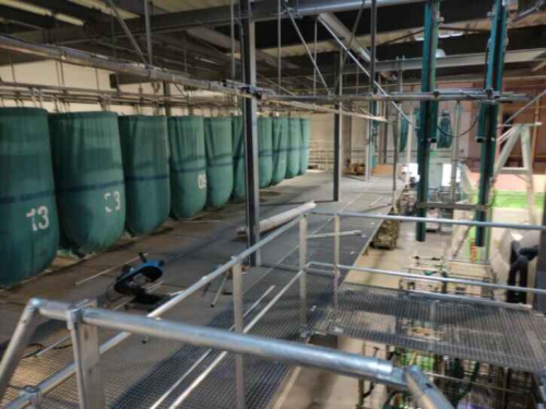 Plateforme de sécurisation la zone de stockage de slings d'une blanchisserie industrielle